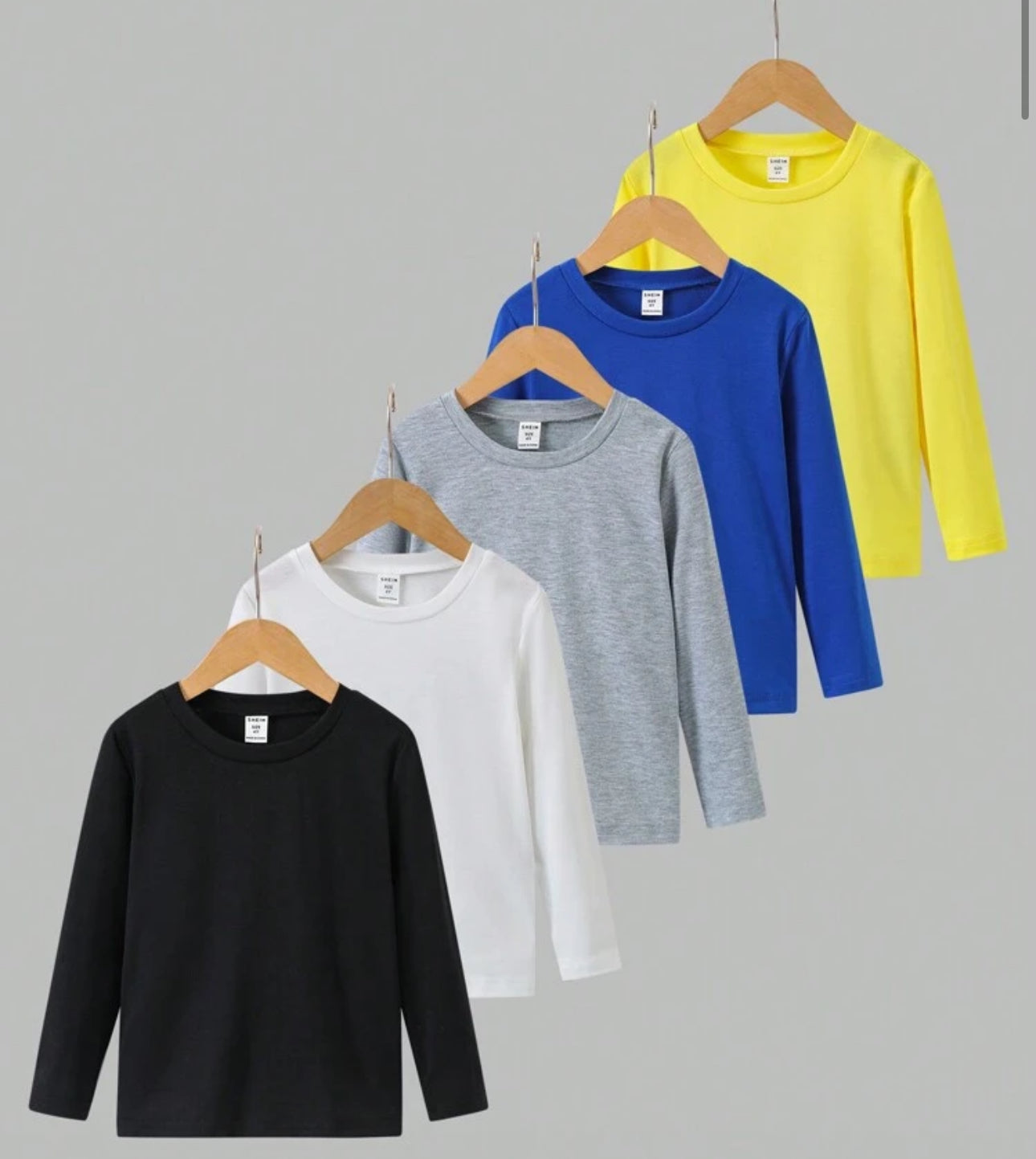 SHEIN 5pcs/Set Young Boy Round Neck T-Shirts In Basic Black, White, Blue, Yellow And Gray Colors. This 5 Pieces T-Shirt Set Offers Various Color Options For Young Boys To Have More Choices And Mix-And-Match In Their Daily Casual Wear. The Round Neck Desig
