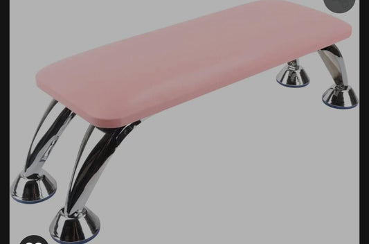 Pink hand rest for nails